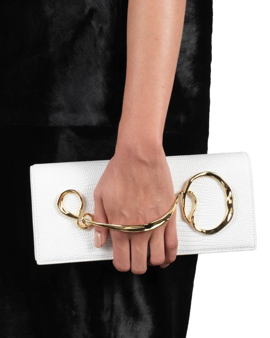 White twisted-detail gold-tone hardware bag with side handle, chain strap, and dual-carry functionality (handheld/shoulder)