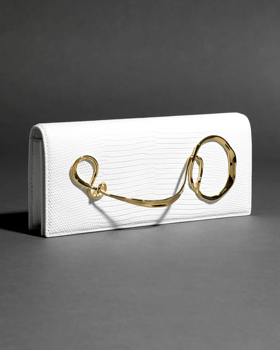 White twisted-detail gold-tone hardware bag with side handle, chain strap, and dual-carry functionality (handheld/shoulder)
