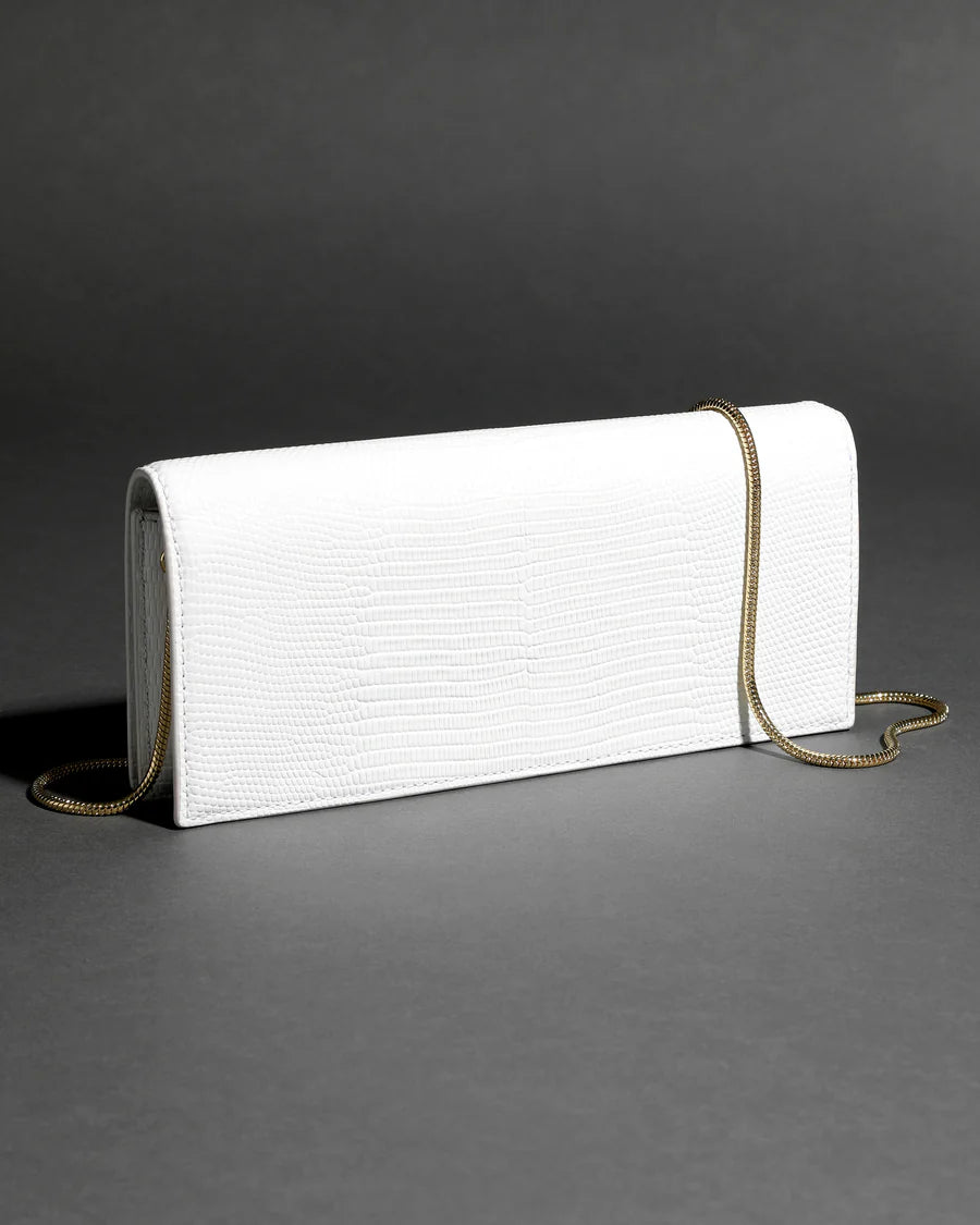 White twisted-detail gold-tone hardware bag with side handle, chain strap, and dual-carry functionality (handheld/shoulder)
