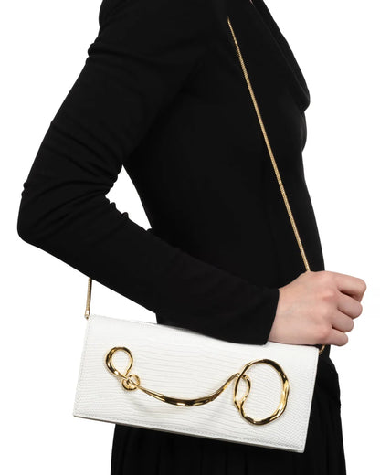 White twisted-detail gold-tone hardware bag with side handle, chain strap, and dual-carry functionality (handheld/shoulder)