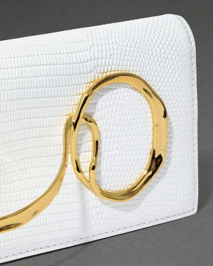 White twisted-detail gold-tone hardware bag with side handle, chain strap, and dual-carry functionality (handheld/shoulder)